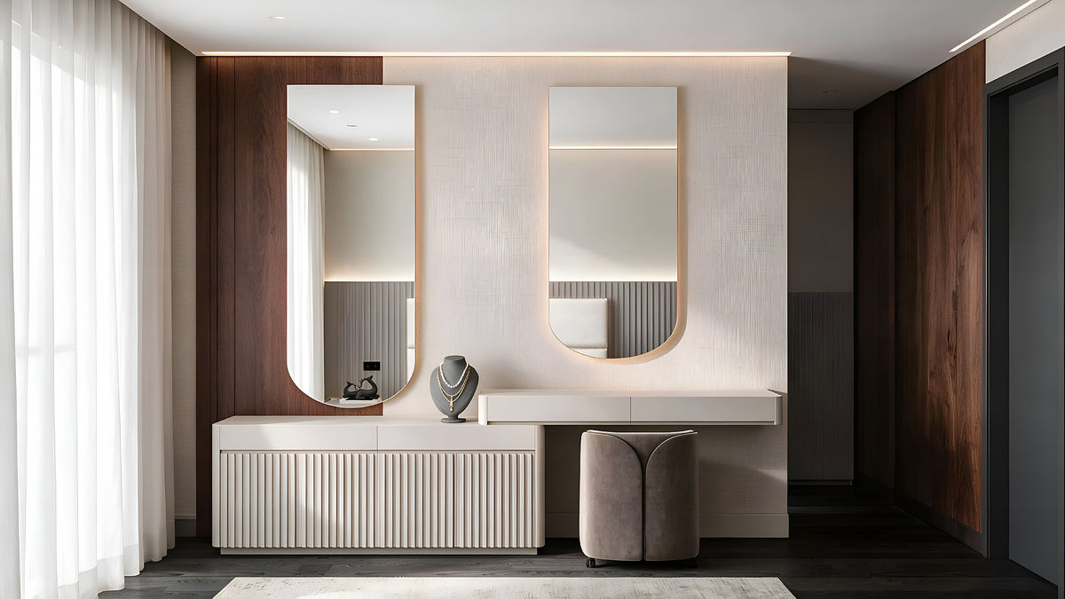 Dressing area with arched backlit mirrors, fluted cabinet and velvet chair, Büyükçekmece villa by Sit Design