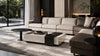 Balance coffee table with a sofa set by the window