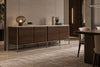 Diamante sideboard against a wall panel