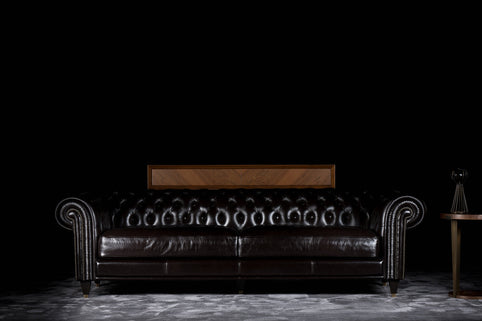 Edward sofa photographed against a dark background