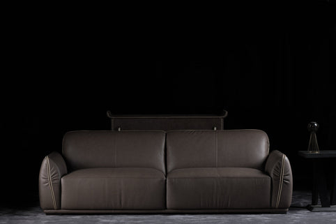 Isabella sofa photographed against a dark background