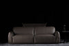 Isabella sofa photographed against a dark background