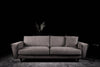 Katherina sofa photographed against a dark background