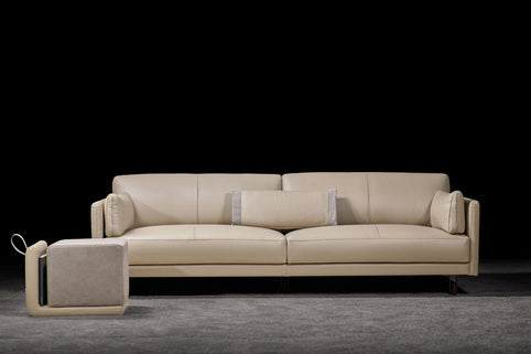 Maxima sofa photographed against a dark background