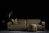 Moria sofa photographed against a dark background