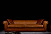 Nakita sofa photographed against a dark background