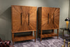Pair of walnut cabinets with a starburst veneer pattern