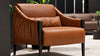 Cognac leather armchair with a dark wooden frame