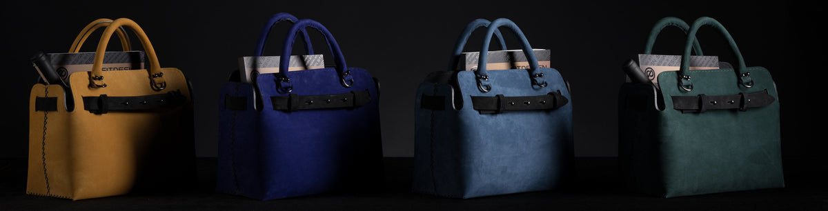 Sitdesign handmade leather magazine holders in four colours