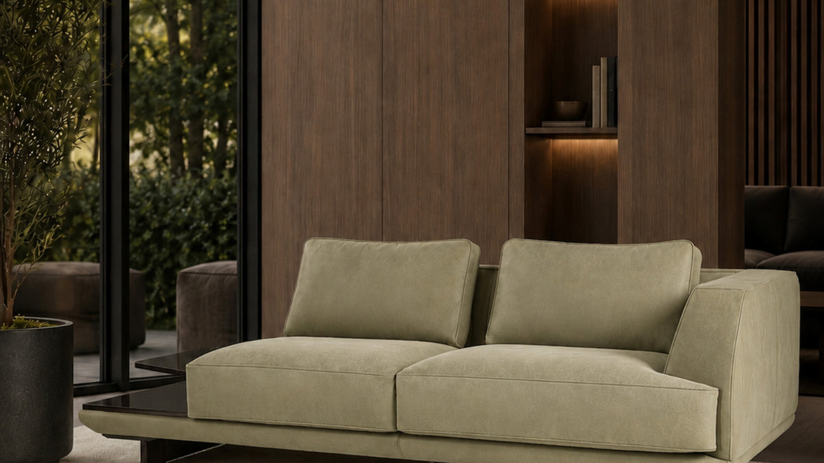 Ranchero sofa in a living room with wood wall panels
