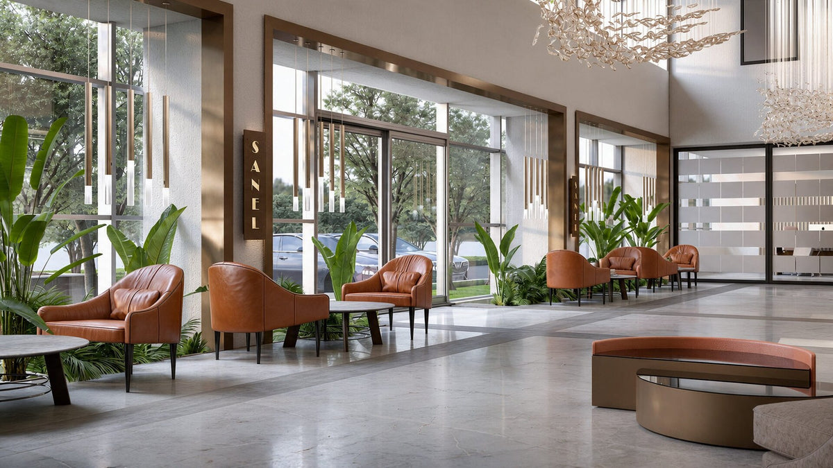 Sanel Asansör reception and waiting area with tan leather armchairs — Sitdesign