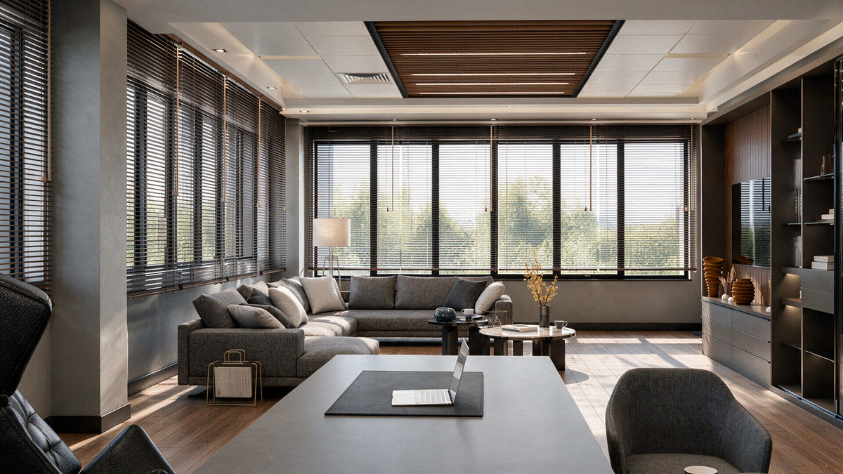 Sanel Asansör executive office with grey sectional and meeting table — Sitdesign
