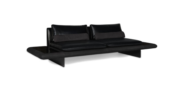Artist sofa in black, three-quarter view