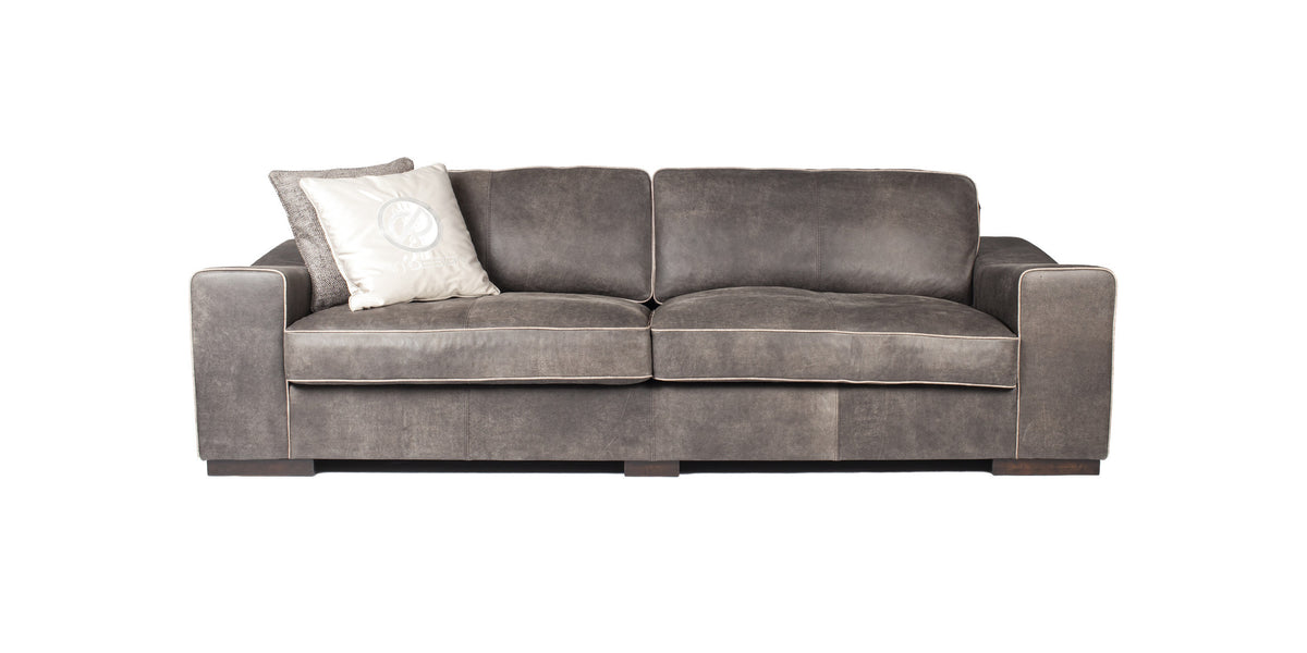 Eros sofa in light grey with scatter cushion, front view