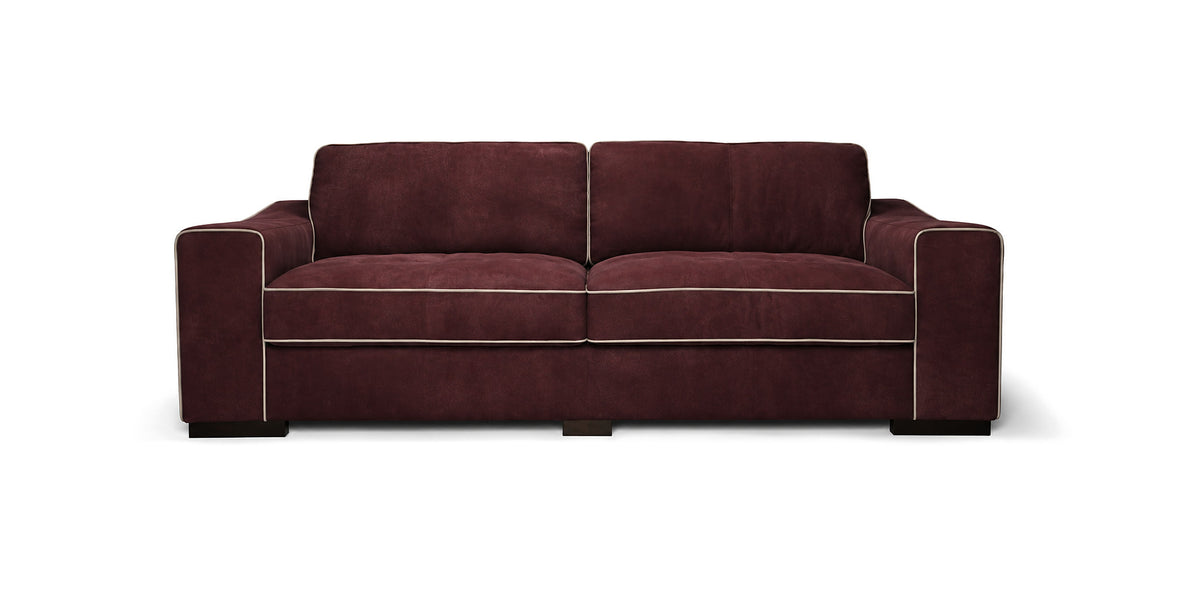 Eros sofa in burgundy with contrast piping, front view