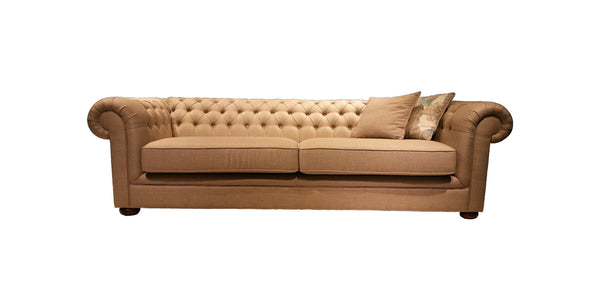 Evesham chesterfield sofa in camel fabric with button-tufted back and scatter cushions, front view