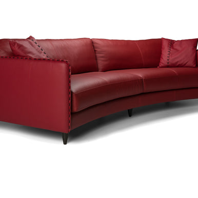 Janette Curved sofa in red leather, three-quarter view