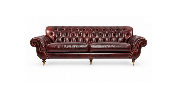 Divano Chesterfield Ramses in pelle bordeaux con schienale capitonné, braccioli arrotondati e gambe tornite con ruote, vista frontale
