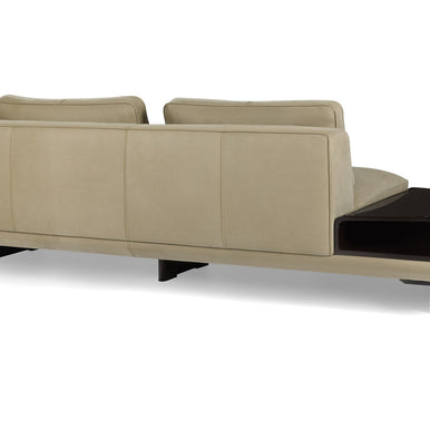 Ranchero sofa in beige with side table, rear three-quarter view from the left