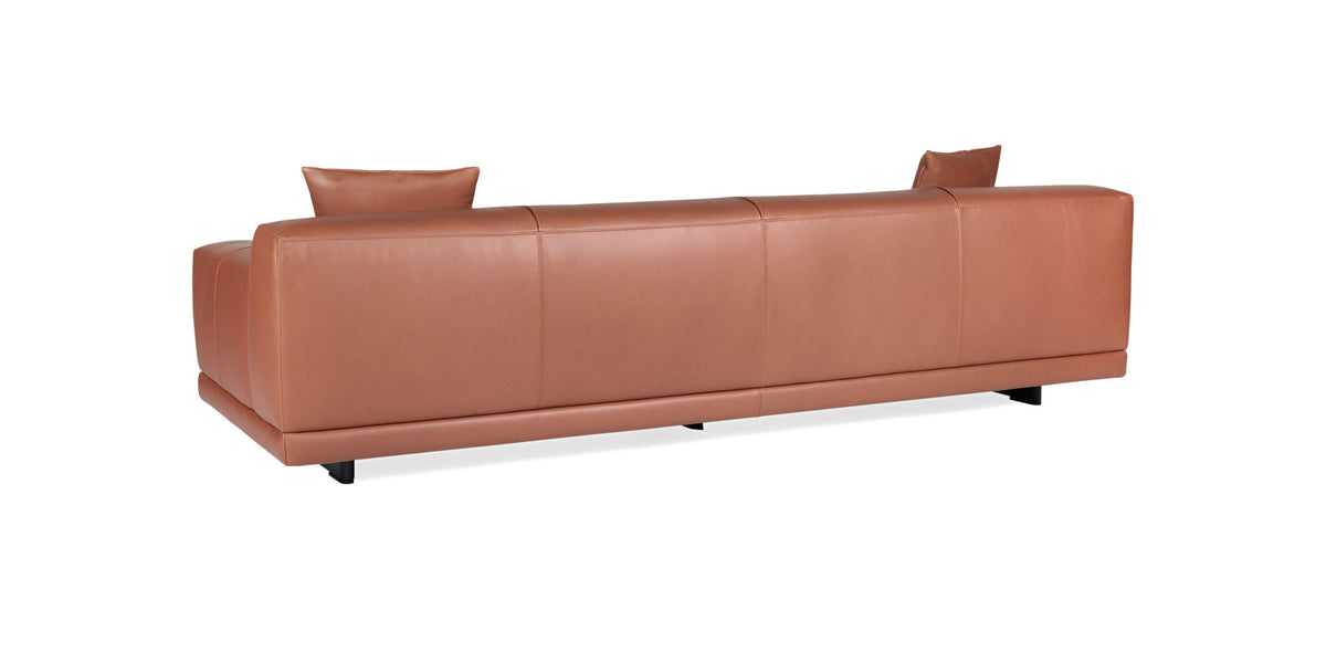 Rosalinda sofa in tan leather, rear three-quarter view