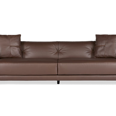 Rosalinda sofa in brown leather with button-tufted back and two scatter cushions, front view